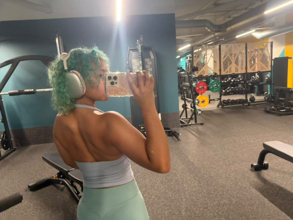 Baddie Betty Gym Gear, Betty wearing gym top & shorts in the Gym.